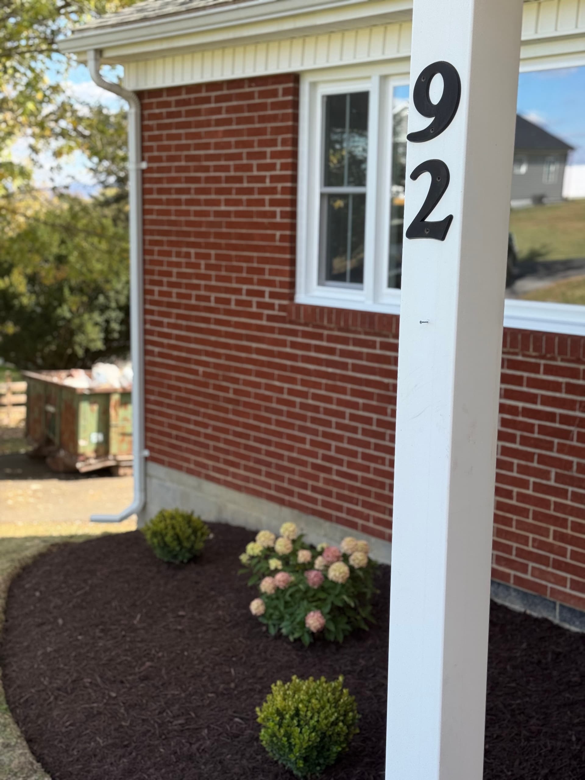 Front Yard Makeover with Fresh Mulch and Vibrant Plants image